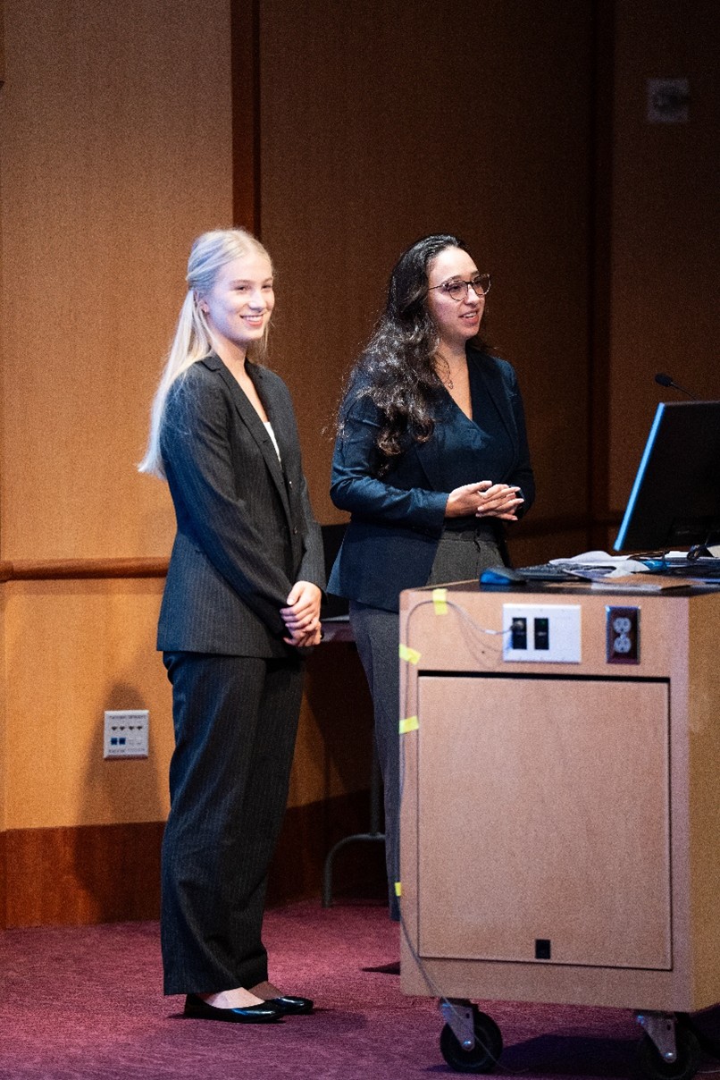 two people giving a lecture