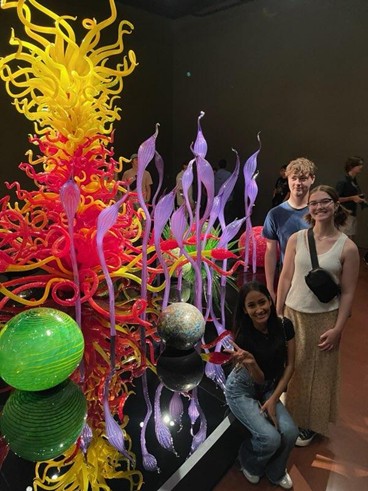 people in front of glass