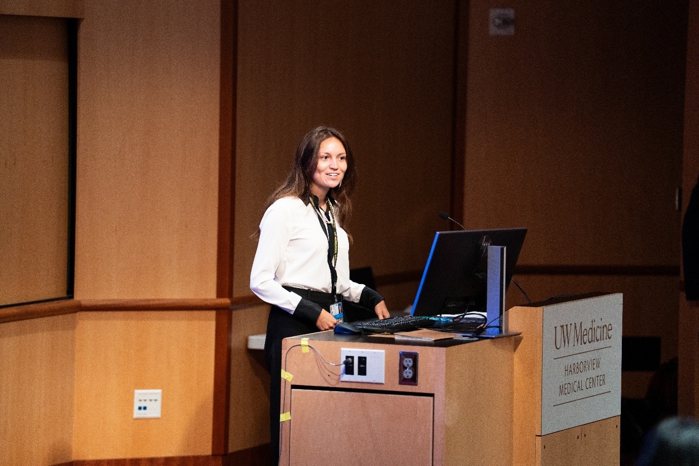 A person standing at a podium