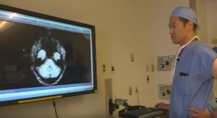 Dr. Ko examines a brain MRI
