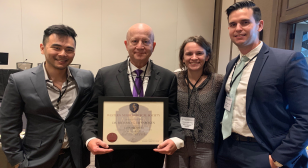 Dr. Ellenbogen Holding Cloward Award